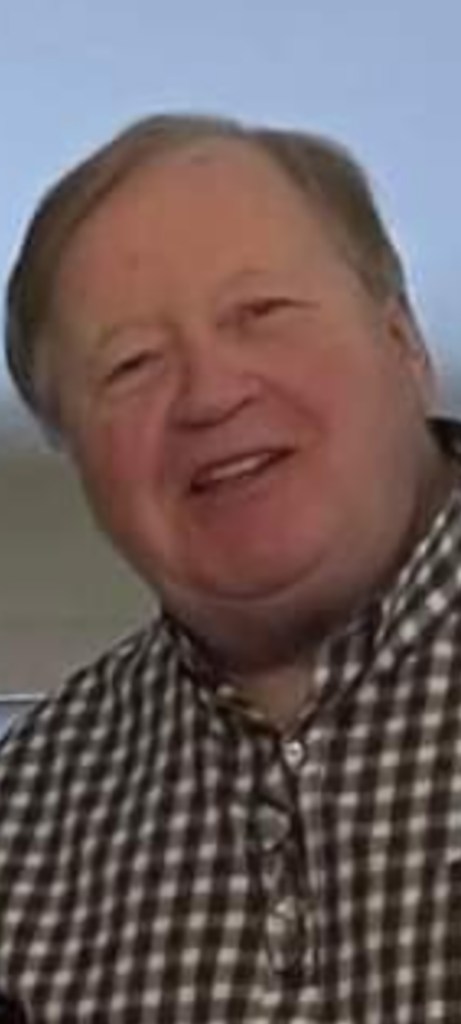 James White at the hole after his hole-in-one at Patriot Hills Golf Club